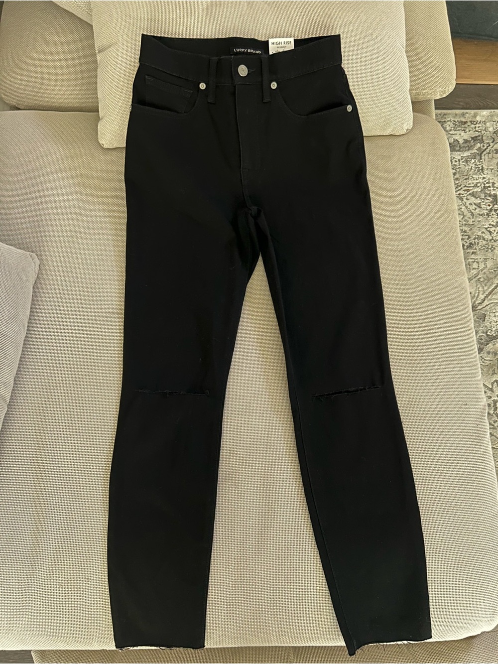 Lucky Brand Black Skinny Jeans with Subtle Knee Slits